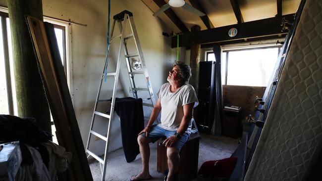 Wongawallan Drive recovers after the Xmas Storms. Resident Craig Walmsley surveys the damage inside his home . Picture Glenn Hampson