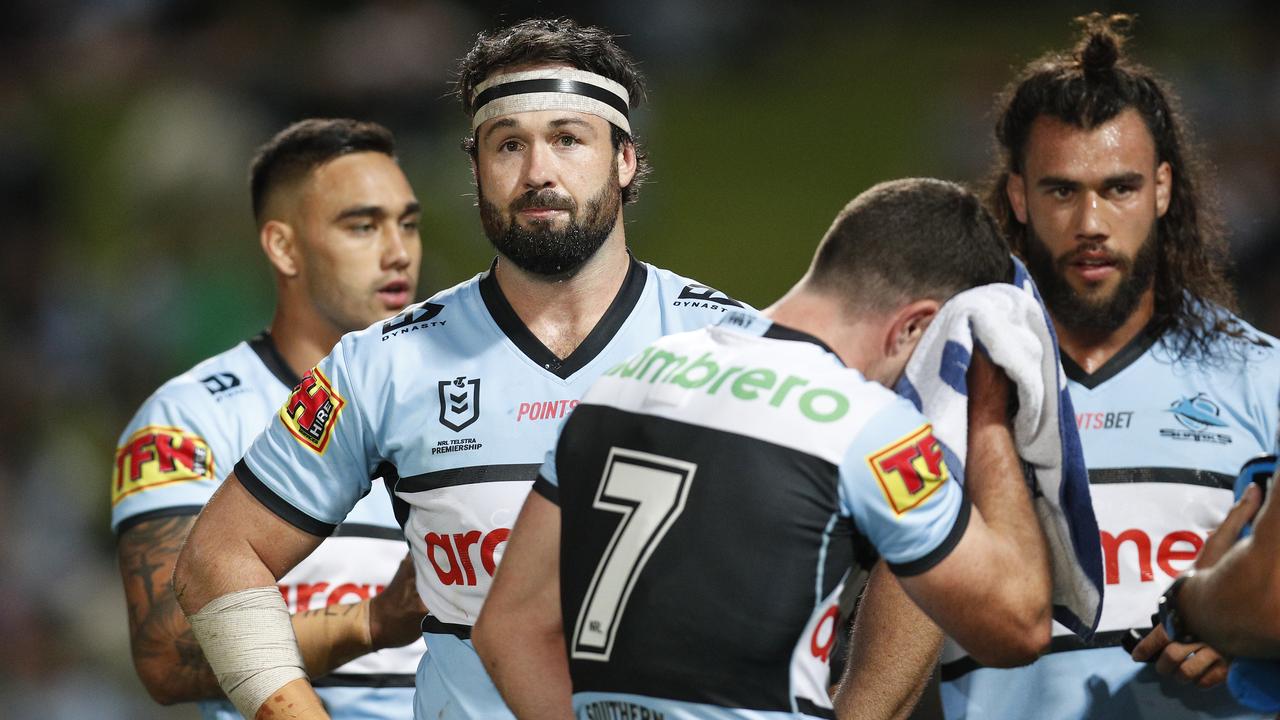 Aaron Woods of the Sharks looks on during another loss.