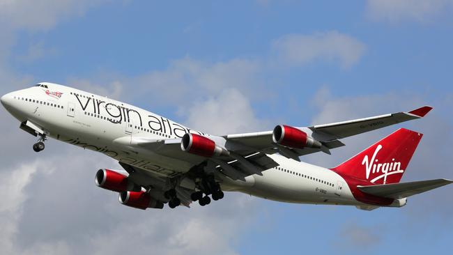 London Heathrow, United Kingdom - August 28, 2015: A Virgin Atlantic Boeing 747-400 with the registration G-VBIG taking off from London Heathrow Airport (LHR) in the United Kingdom. Virgin Atlantic Airways is a British airline with a base at London Heathrow airport.