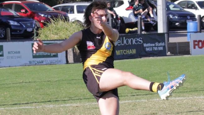 Jesse Uren gets a kick away for Mitcham. Picture: Paul Corris