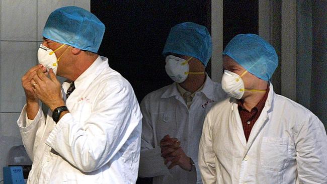 A World Health Organization (WHO) SARS team during the 2004 outbreak.