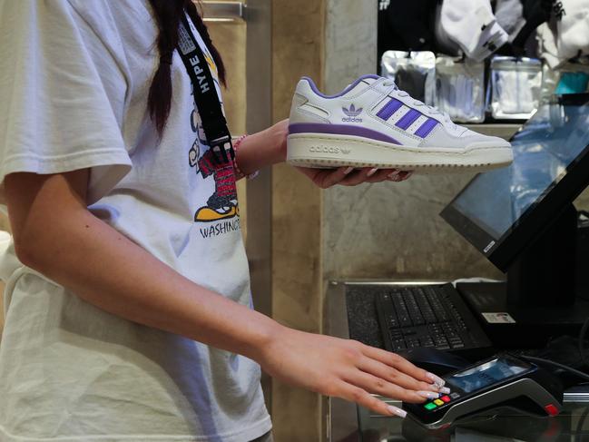 SYDNEY, AUSTRALIA -NewsWire Photos APRIL 12 2023 - A general view of a a pair of Adidas sneakers being sold in a retail store in Sydney CBD during the Easter School Holidays. Picture NCA Newswire / Gaye Gerard