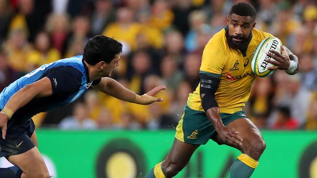 Marika Koroibete gets past an Argentina defender. Picture: Getty Images