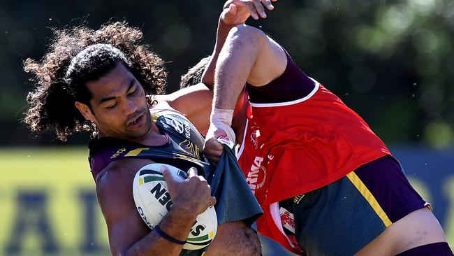 BRISBANE, AUSTRALIA — SEPTEMBER 05: Adam Blair is tackled during a Brisbane Broncos NRL training session on September 5, 2017 in Brisbane, Australia. (Photo by Bradley Kanaris/Getty Images)