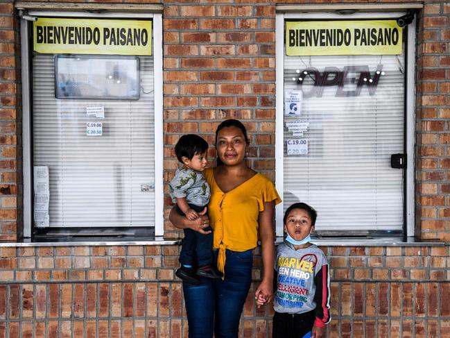 Amanda Garcia (23), a migrant from Guatemala, poses with her sons as they wait for a bus between the cities of Brownsville, Texas, and Tamaulipas, Mexico. Picture: AFP