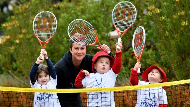 Tennis coach Didi Paronis with her Tia Cuci, 4, Lily Randle, 3, and Henry Tierey, 3 during her Little Tennis class at Ladybird Manor Montessori AAP/Mark Brake.