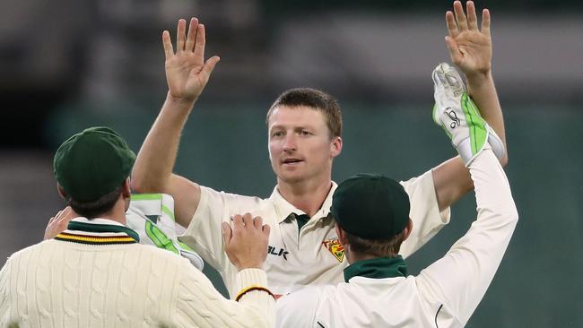 Tasmanian fast bowler Jackson Bird celebrates taking the wicket of Victoria’s Dan Christian at the MCG on Thursday night.