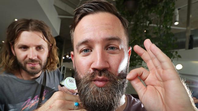 Matt Fay, 31 of Lutwyche, with hairdresser Jules Tognini, Fortitude Valley. Picture: Liam Kidston.