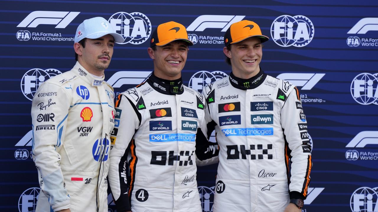 McLaren driver Lando Norris (centre), celebrates his pole position flanked with Ferrari’s Charles Leclerc of Monaco and teammate Oscar Piastri. (AP Photo/Manu Fernandez)