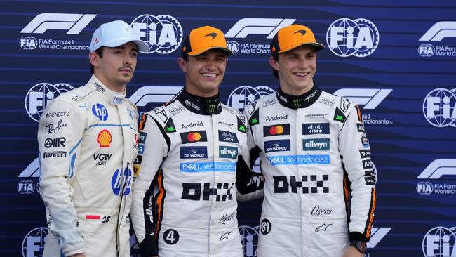 McLaren driver Lando Norris (centre), celebrates his pole position flanked with Ferrari’s Charles Leclerc of Monaco and teammate Oscar Piastri. (AP Photo/Manu Fernandez)