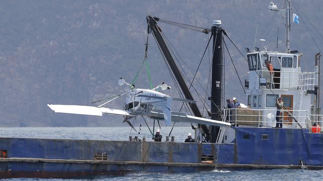 The plane being recovered after the December 2014 deaths of photographer Tim Jones and pilot Sam Langford. Picture: Luke Bowden