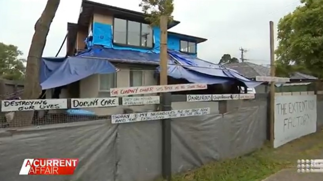 She has plastered signs across her home attacking Extension Factory. Picture: A Current Affair