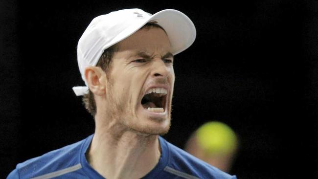 Britain's Andy Murray reacts after he breaks against John Isner of the United States during the final of the Paris Masters tennis tournament at the Bercy Arena in Paris, Sunday, Nov. 6, 2016. Murray won 6-3, 6-7, 6-4. (AP Photo/Michel Euler). Picture: Michel Euler