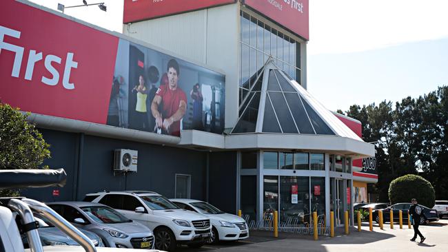 People heading in to Fitness First in Rockdale to exercise yesterday. Picture: Adam Yip