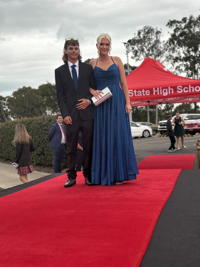 The students of Urangan State High School arriving at their formal.