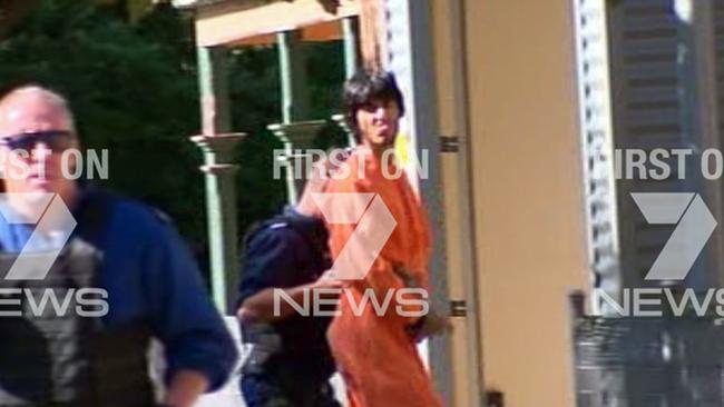 One of the four men charged with conspiring to do an act in preparation of a terrorist attack which led to the shooting murder of Curtis Cheng. Picture: Channel Seven