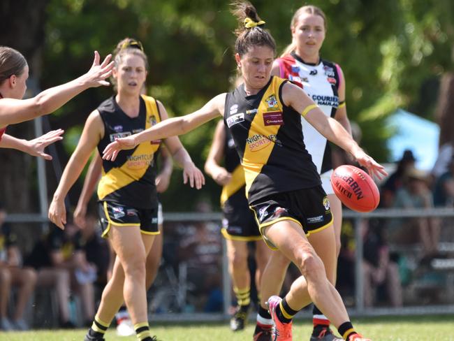 Nightcliff's Eliza Morrison in typical pose, running hard and kicking long. Picture: Tymunna Clement AFLNT/Media