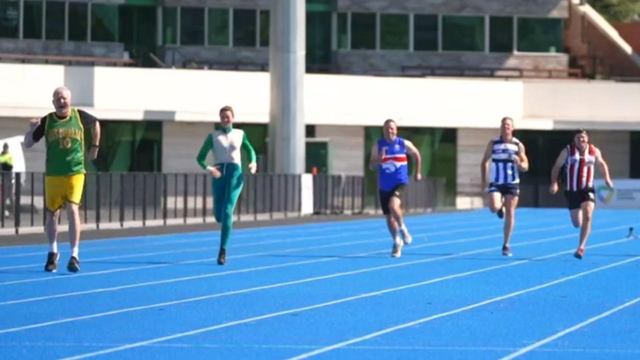 Andrew Gaze, in lane 1, pulls his hamstring mid-race.