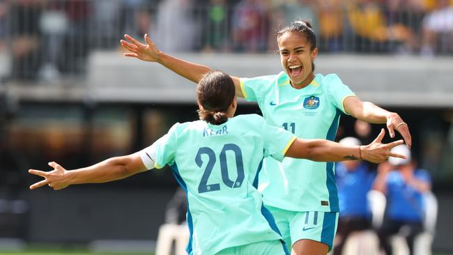 PERTH, AUSTRALIA - OCTOBER 29: Mary Fowler of the Matildas and Sam Kerr of the Matildas celebrate a goal during the AFC Women's Asian Olympic Qualifier match between Philippines and Australia Matildas at Optus Stadium on October 29, 2023 in Perth, Australia. (Photo by James Worsfold/Getty Images)