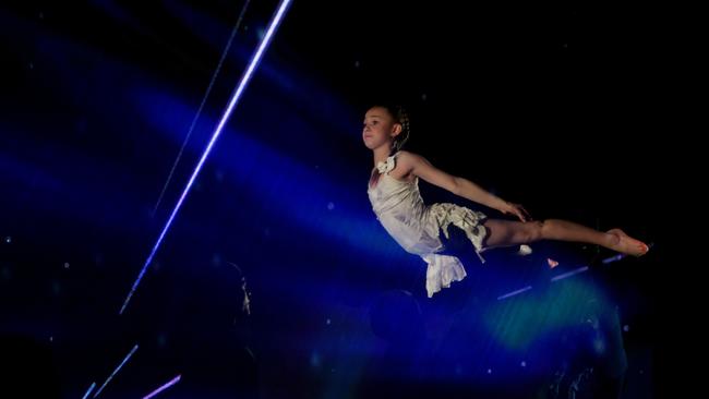 A young dancer flies at the launch of the conference  Picture: AAP / Tracey Nearmy