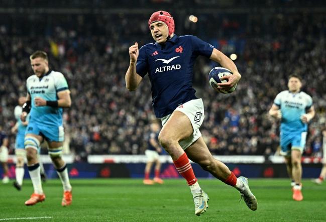 Record: France wing Louis Bielle-Biarrey runs to score his team's second try against Scotland