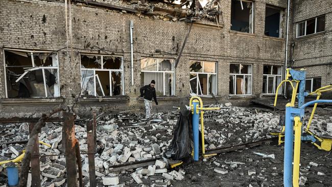 A man walks outside a destroyed school after a missile strike in Kramatorsk, Dombass regions, on March. Picture: AFP