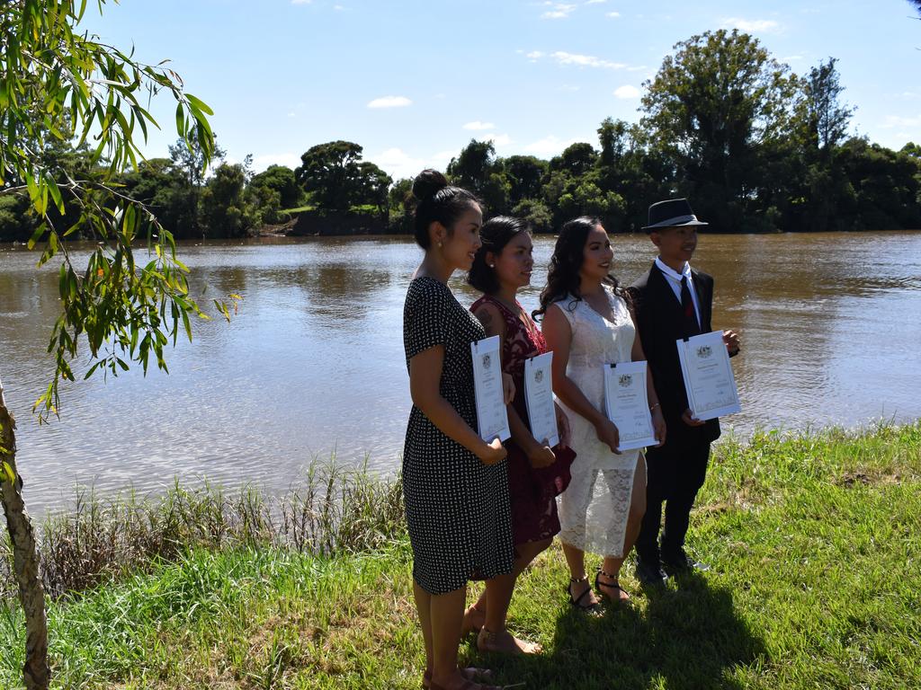 Jinapat Munro, Rowena Innes, Afrel Newman and John Libiran with their citizenships. (Credit: Adam Daunt)