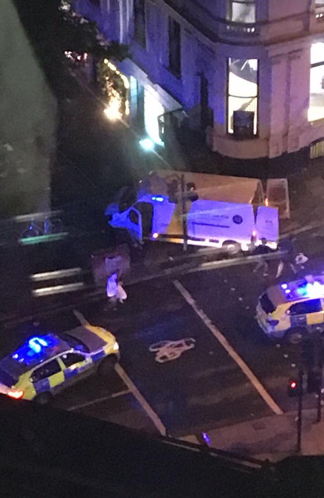 The van used by the attackers where it crashed at the south end of London Bridge just after 10pm. Picture: Twitter