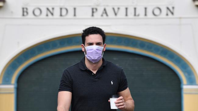 A Bondi resident leaves a COVID-19 testing clinic set up by St. Vincent’s Hospital at the Bondi Pavilion on Bondi Beach on April 1. (AAP Image/Dean Lewins)