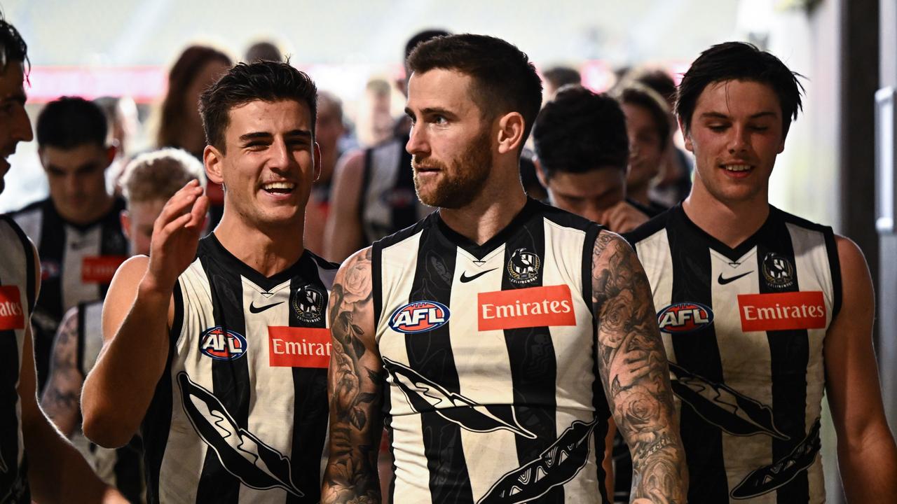 PERTH, AUSTRALIA - MAY 22: Jeremy Howe of the Magpies leads the into the rooms after the win during the 2022 AFL Round 10 match between the Fremantle Dockers and the Collingwood Magpies at Optus Stadium on May 22, 2022 in Perth, Australia. (Photo by Daniel Carson/AFL Photos via Getty Images)