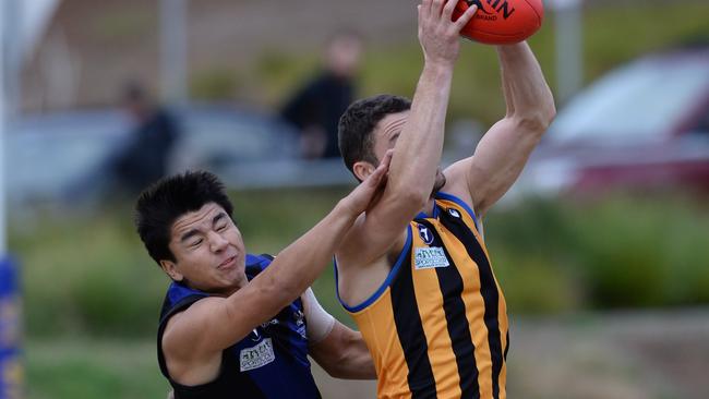 St Bernard's skipper Simon Caven grabs a mark. Picture: Chris Eastman