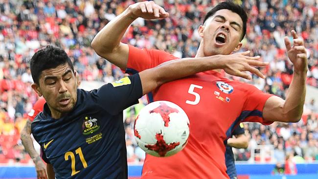 Massimo Luongo gets a little physical with Francisco Silva.