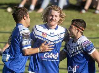 MAKING AN IMPRESSION: Liam Bloomer (centre) celebrates with his Grafton Ghosts teammates in a reserve grade win over the South Grafton Rebels earlier this year. Bloomer was dubbed best on ground in his first grade debut. Picture: Adam Hourigan