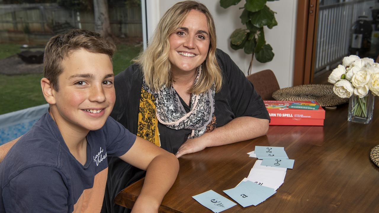 Amy Deane with her son Luke. Sprouts Reading Clinic is Amy's new business offering Multisensory Structured Language (MSL) education for reading and writing. Picture: Nev Madsen.