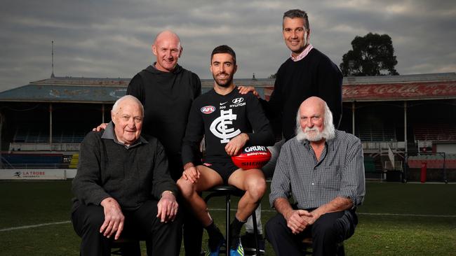 John Nicholls, front left, with famous Blues Craig Bradley, Kade Simpson, Stephen Silvagni and Bruce Doull in 2018. Picture: Michael Willson/AFL Media