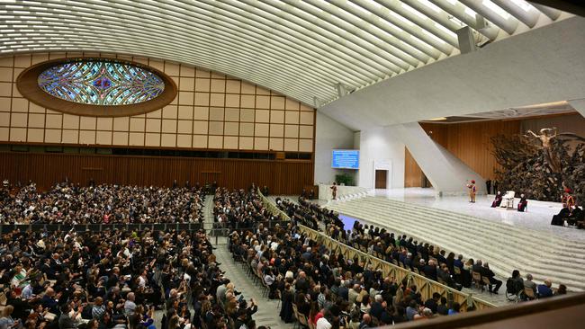 After giving his address he meandered his way through the crowd, shaking the hands of many attendees including members of the foreign press. Picture: AFP