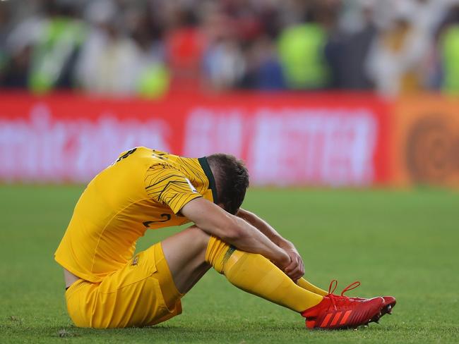 AL AIN, UNITED ARAB EMIRATES - JANUARY 25:  Milos Degenek of Australia looks dejected after  the AFC Asian Cup quarter final match between United Arab Emirates and Australia at Hazza Bin Zayed Stadium on January 25, 2019 in Al Ain, United Arab Emirates.  (Photo by Francois Nel/Getty Images)