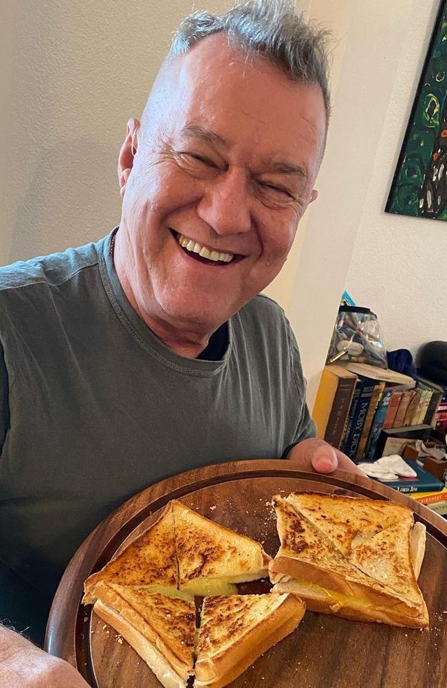 Jimmy Barnes with THE cheese toastie. Picture: @jimmybarnesofficial/Instagram