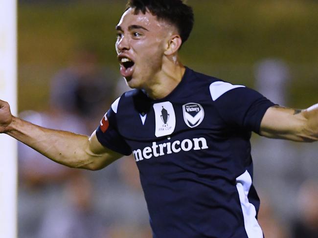 ADELAIDE, AUSTRALIA - DECEMBER 01:Luis Lawrie-Lattanzio of the Victory celebrates his teams first goal kicked by Anthony Leban of the Victory  during the FFA Cup round of 32 match between Adelaide City FC and Melbourne Victory at Marden Sports Complex on December 01, 2021 in Adelaide, Australia. (Photo by Mark Brake/Getty Images)