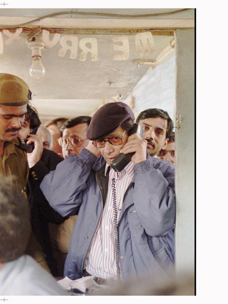 The ‘Bikini Killer’ talks on the telephone after being granted bail in New Delhi in 1997. Picture: Supplied