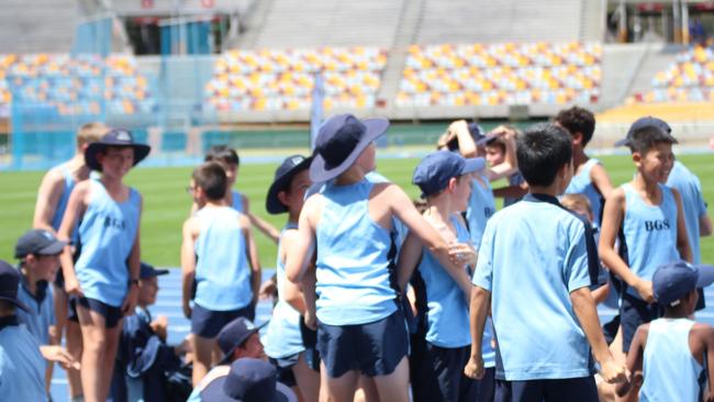 Brisbane Grammar won the Junior Track and Field Championships today by the smallest of margins.