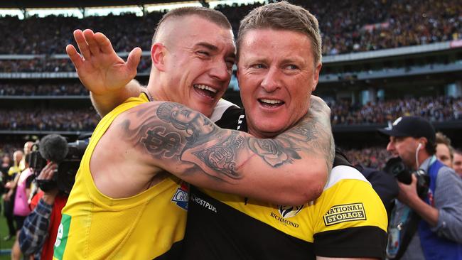 Damien Hardwick celebrates the premiership with Dustin Martin. Picture: Phil Hillyard