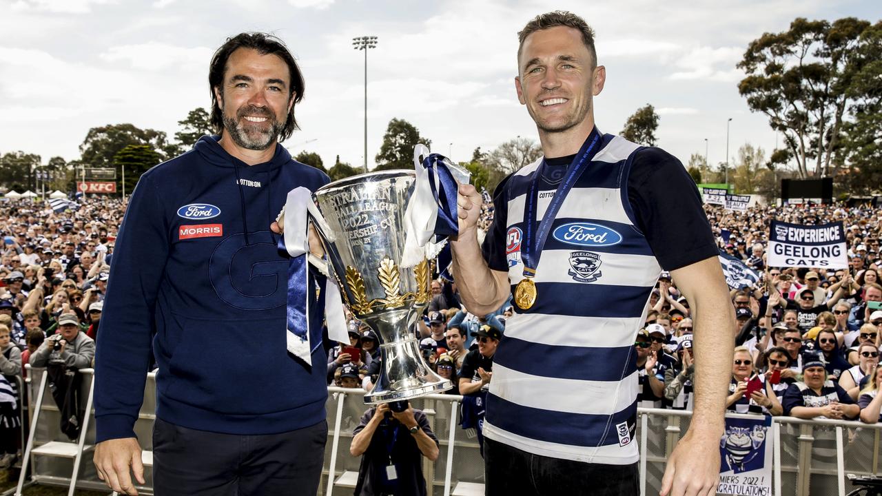 Chris Scott and Joel Selwood are presented on stage during their celebrations after winning the 2022 AFL Grand Final, at St Mary's Football Club Oval on September 25, 2022 in Melbourne, Australia. (Photo by Sam Tabone/Getty Images)