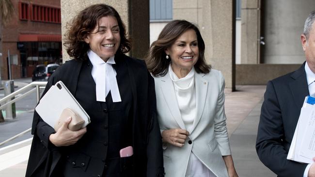 Lisa Wilkinson arrives at the Federal Court in Sydney with legal representatives on Wednesday. Picture: NCA NewsWire / Simon Bullard.