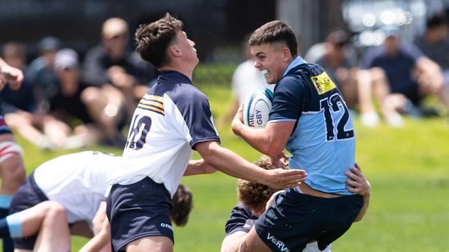 Action between the NSW Blues v ACT Brumbies last year in the competition rebranded as the Super Rugby 16s series. Pic: Julian Andrews