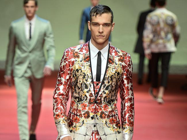 MILAN, ITALY - JUNE 21:  A model walks the runway at the Dolce & Gabbana Spring Summer 2015 fashion show during Milan Menswear Fashion Week on June 21, 2014 in Milan, Italy.  (Photo by Catwalking/Getty Images)