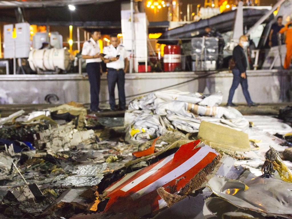 Wreckage from Lion Air flight JT 610 lies at the Tanjung Priok port in Jakarta, Indonesia. Picture: Getty