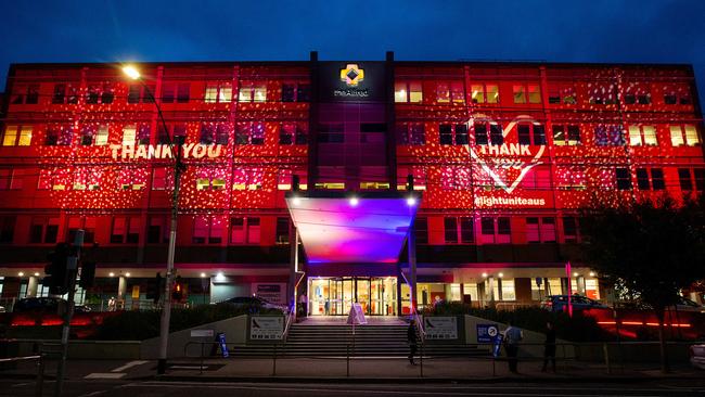 The Alfred Hospital was last night lit up with messages of thanks for healthcare workers. Picture: Mark Stewart