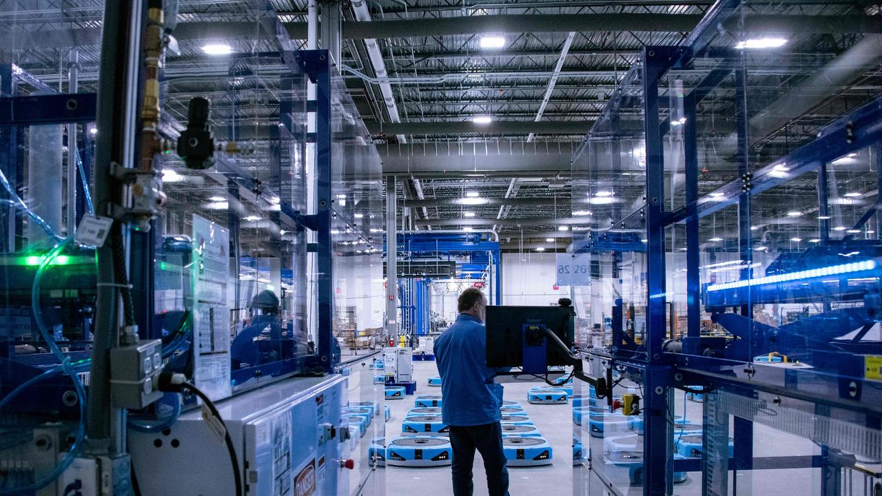 Employees in Amazon’s robotic division. Picture: Joseph Prezioso/AFP