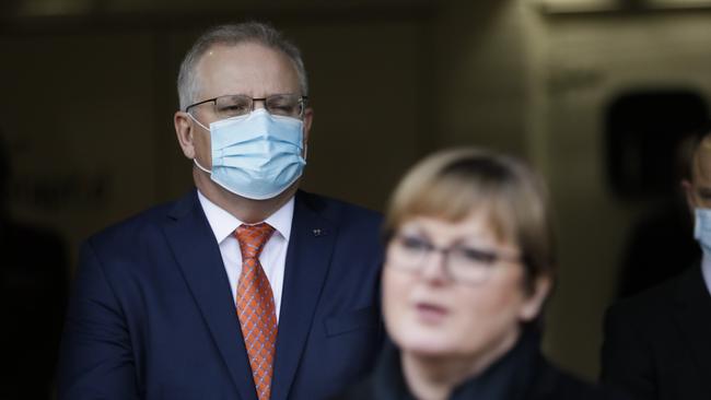 Prime Minister Scott Morrison and Defence Minister Linda Reynolds during a visit to Datapod, a defence contracting business in Canberra. Picture: Sean Davey.